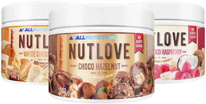Drei Becher Nutlove Nusscreme in den Geschmacksrichtungen Schoko-Haselnuss, Weißschokolade und Himbeere.