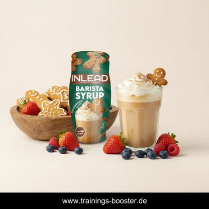 Inlead Nutrition Barista Syrup mit einem cremigen Kaffee, Lebkuchenmännchen und frischen Beeren.