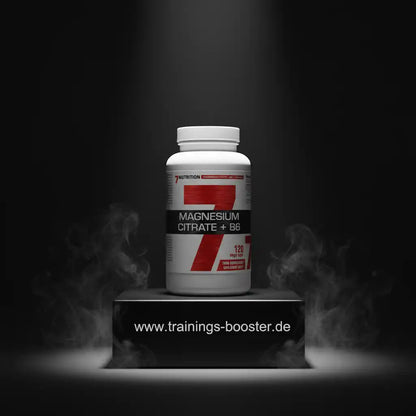 Weiße Dose Magnesium Citrat + B6 Nahrungsergänzungsmittel von 7Nutrition auf schwarzem Podest