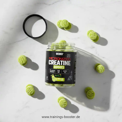 Weider Micronized Creatine Gummies in Sour Lime Geschmack auf weißem Marmor.